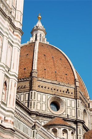 simsearch:400-05733973,k - Florence Cathedral of Santa Maria del Fiore or Duomo di Firenze, detail of Brunelleschi's dome against the blue sky. Stock Photo - Budget Royalty-Free & Subscription, Code: 400-05711095