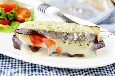 appetizer eggplant  parmigiana with cheese and tomato Stock Photo - Budget Royalty-Free & Subscription, Code: 400-05711522