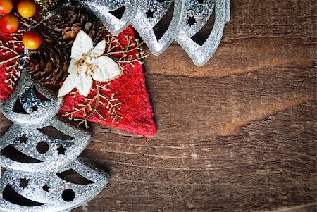 Christmas decoration on wooden plank Stock Photo - Budget Royalty-Free & Subscription, Code: 400-05711661