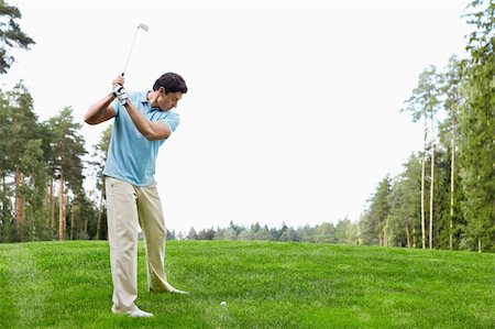 simsearch:400-05748592,k - Mature man playing golf Stock Photo - Budget Royalty-Free & Subscription, Code: 400-05711879