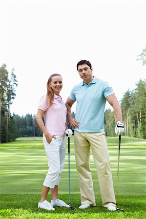 simsearch:400-05753041,k - The happy couple on the golf course Stock Photo - Budget Royalty-Free & Subscription, Code: 400-05711884