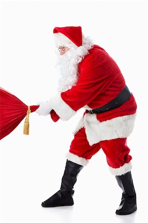 simsearch:400-05711909,k - Santa Claus pulls a bag on a white background Stock Photo - Budget Royalty-Free & Subscription, Code: 400-05711924