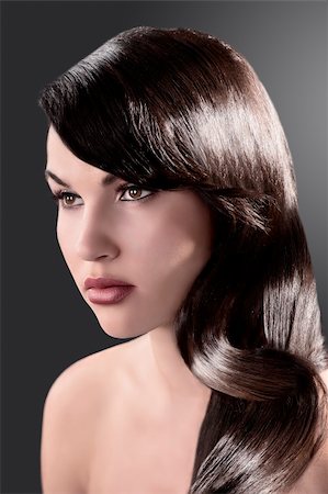 beauty close up portrait of a long haired brunette with very shiny hair Foto de stock - Super Valor sin royalties y Suscripción, Código: 400-05711934