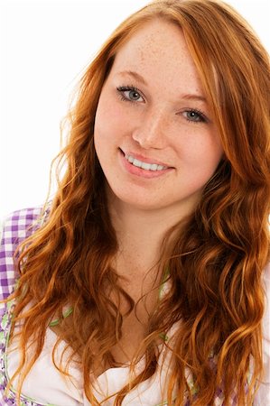 simsearch:400-07087495,k - portrait of a smiling redhead woman in bavarian dress on white background Stock Photo - Budget Royalty-Free & Subscription, Code: 400-05713714