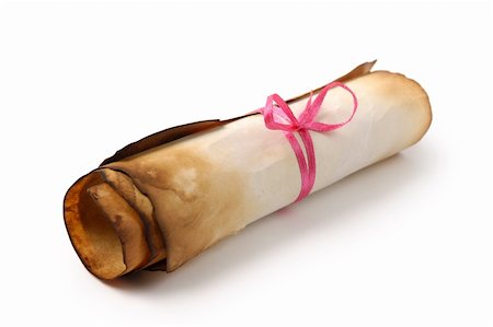Roll of yellowish burnt vintage parchment tied with a red ribbon Isolated over white background Stock Photo - Budget Royalty-Free & Subscription, Code: 400-05724068