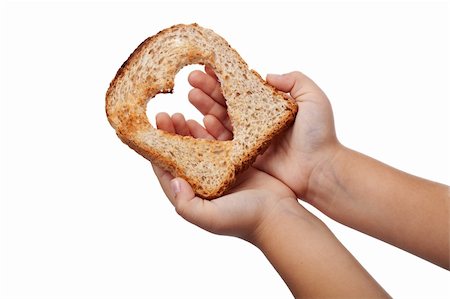 simsearch:400-05701644,k - Giving food with love concept - slice of bread in child hands, isolated Stock Photo - Budget Royalty-Free & Subscription, Code: 400-05725464