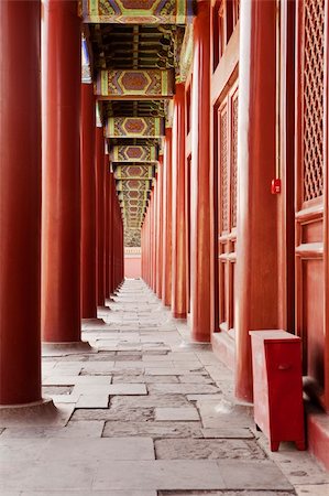 A long colonnade of red pillars along the West building of the Taimiao Ancestral Temple in Beijing, China. The temple is now the People's Cultural Palace. Stock Photo - Budget Royalty-Free & Subscription, Code: 400-05725710