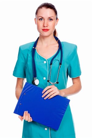 simsearch:400-04178933,k - Pretty female doctor or nurse with clipboard Stock Photo - Budget Royalty-Free & Subscription, Code: 400-05725779