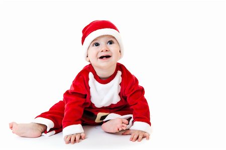 simsearch:400-05727835,k - Portrait of cute little boy in Santa Claus costume. Isolated on white Fotografie stock - Microstock e Abbonamento, Codice: 400-05727825