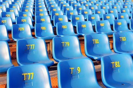 empty theatre chair - Row of plastic chairs in an open theater Stock Photo - Budget Royalty-Free & Subscription, Code: 400-05728007