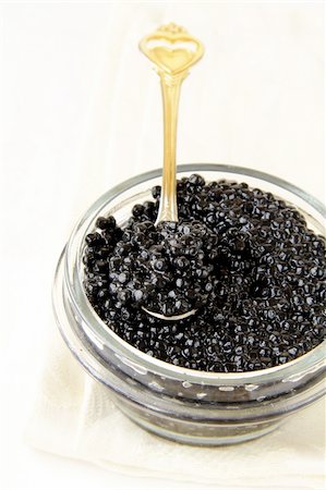 rice bowl - Black caviar in a glass jar on a white background Foto de stock - Super Valor sin royalties y Suscripción, Código: 400-05728020