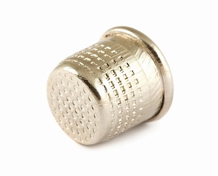 stitching tools - Silver thimble isolated on white background Stock Photo - Budget Royalty-Free & Subscription, Code: 400-05728078