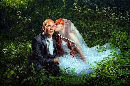 dress woman walk forest - Wedding couple sitting on grass in forest Stock Photo - Budget Royalty-Free & Subscription, Code: 400-05728126