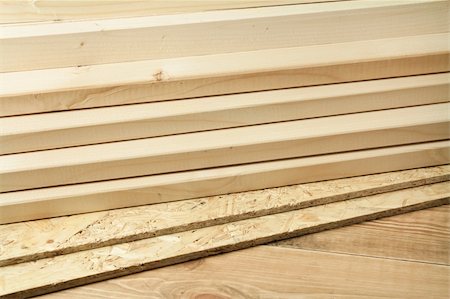Construction material- stack of wood planks Stock Photo - Budget Royalty-Free & Subscription, Code: 400-05728629