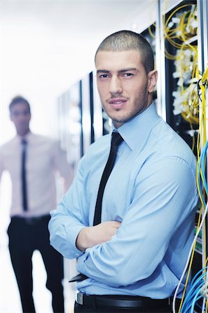 group of young business people it engineer in network server room solving problems and give help and support Stock Photo - Budget Royalty-Free & Subscription, Code: 400-05728868