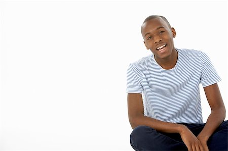 simsearch:400-04405553,k - Teenage Boy Sitting In Studio Stock Photo - Budget Royalty-Free & Subscription, Code: 400-05728887