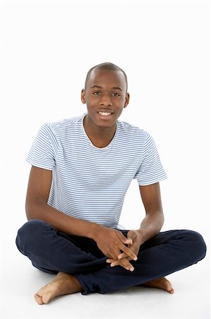 simsearch:400-04405553,k - Teenage Boy Sitting In Studio Stock Photo - Budget Royalty-Free & Subscription, Code: 400-05728883