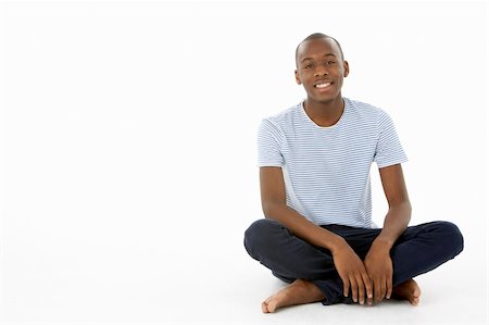 simsearch:400-04405553,k - Teenage Boy Sitting In Studio Stock Photo - Budget Royalty-Free & Subscription, Code: 400-05728891