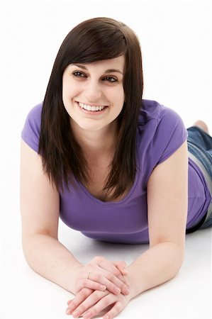 Young Woman Laying On Stomach Stock Photo - Budget Royalty-Free & Subscription, Code: 400-05728980