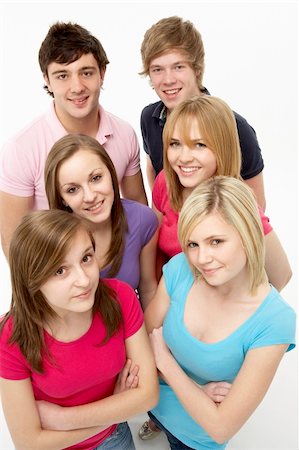 simsearch:400-05729065,k - Group Of Teenage Friends In Studio Fotografie stock - Microstock e Abbonamento, Codice: 400-05729036