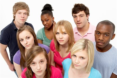 simsearch:400-05729065,k - Group Of Teenage Friends In Studio Fotografie stock - Microstock e Abbonamento, Codice: 400-05729032