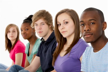 simsearch:400-05729065,k - Group Of Teenage Friends In Studio Fotografie stock - Microstock e Abbonamento, Codice: 400-05729060