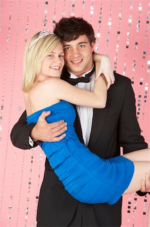 simsearch:400-05729065,k - Young Couple Dressed For Party Fotografie stock - Microstock e Abbonamento, Codice: 400-05729074