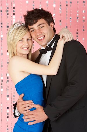 simsearch:400-05729065,k - Young Couple Dressed For Party Fotografie stock - Microstock e Abbonamento, Codice: 400-05729073