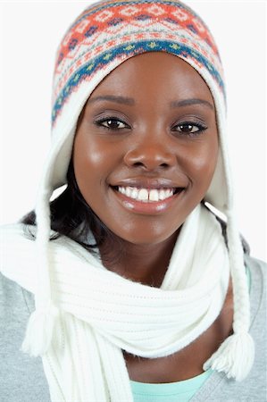 Close up of smiling woman with winter hat on against a white background Foto de stock - Super Valor sin royalties y Suscripción, Código: 400-05729095
