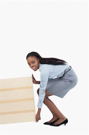 simsearch:400-05718227,k - Portrait of a businesswoman dragging a panel against a white background Stock Photo - Budget Royalty-Free & Subscription, Code: 400-05729318