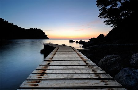 Pier on a rocky coast Stock Photo - Budget Royalty-Free & Subscription, Code: 400-05729563