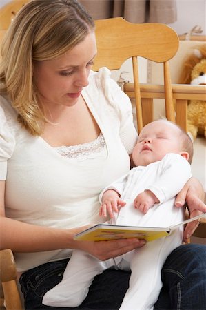 Mother Reading Story To Baby In Nursery Stock Photo - Budget Royalty-Free & Subscription, Code: 400-05729577