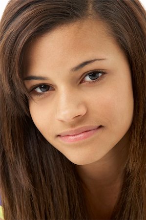 Studio Portrait of Smiling Teenage Girl Stock Photo - Budget Royalty-Free & Subscription, Code: 400-05729768