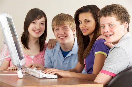 Teenagers on Computer at Home Stock Photo - Budget Royalty-Free & Subscription, Code: 400-05729892