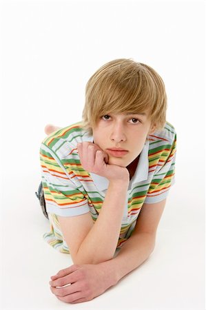 Studio Portrait Of Serious Teenage Boy Stock Photo - Budget Royalty-Free & Subscription, Code: 400-05729937