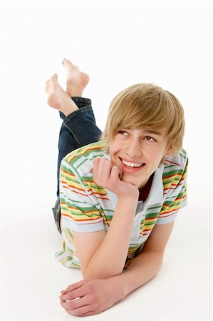 simsearch:400-05734868,k - Studio Portrait Of Happy Teenage Boy Stock Photo - Budget Royalty-Free & Subscription, Code: 400-05729940