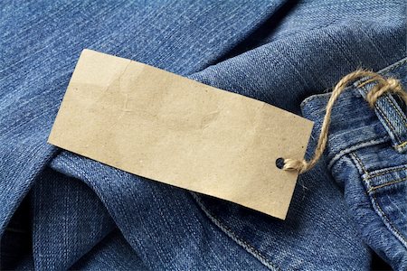 Jeans trousers with blank paper label Stock Photo - Budget Royalty-Free & Subscription, Code: 400-05720005