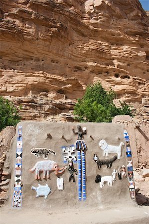 Representation on the wall of animals and Dogon masks, Mali (Africa). Stock Photo - Budget Royalty-Free & Subscription, Code: 400-05721340