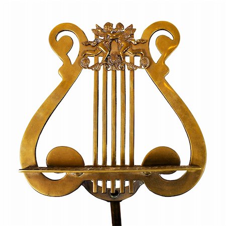 pupitre (musique) - Antique music stand, made of  bronze, isolated on white background Photographie de stock - Aubaine LD & Abonnement, Code: 400-05721374