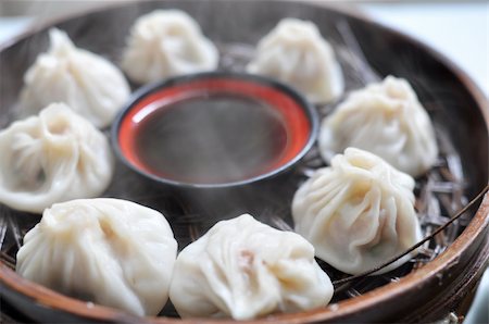 A plate of steamed dumplings in Xian, China Stock Photo - Budget Royalty-Free & Subscription, Code: 400-05721474