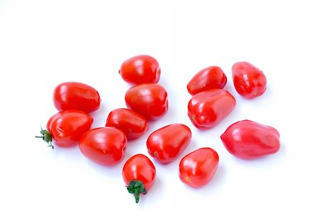 simsearch:400-06138091,k - Cherry tomato fruits on a white background Foto de stock - Super Valor sin royalties y Suscripción, Código: 400-05721470