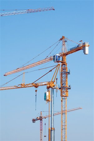 elevated sky - Construction cranes on the building site Stock Photo - Budget Royalty-Free & Subscription, Code: 400-05721870
