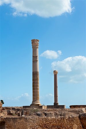stone base - Two ancient roman pillars against a blue sky Stock Photo - Budget Royalty-Free & Subscription, Code: 400-05734031