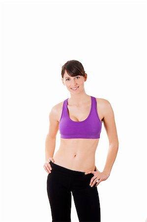 female athletic modeling fitness - Beautiful and athletic young woman posing over a white background Stock Photo - Budget Royalty-Free & Subscription, Code: 400-05734368
