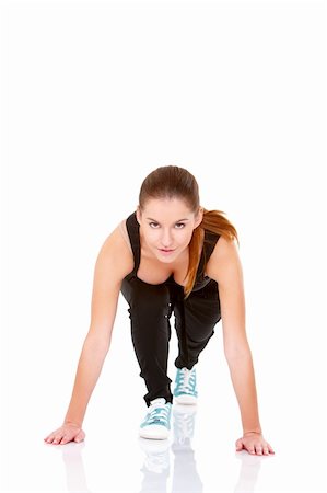 simsearch:400-04345817,k - Cute fitness woman doing stretching exercise on white Stockbilder - Microstock & Abonnement, Bildnummer: 400-05734524