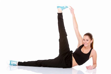 simsearch:400-04345817,k - Adorable fitness woman doing stretching exercise on white Stockbilder - Microstock & Abonnement, Bildnummer: 400-05734520
