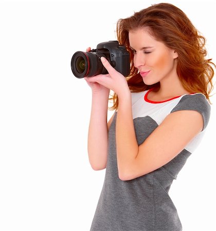 stylish woman snapshot - Cute young woman in gray dress with digtal camera on white Stock Photo - Budget Royalty-Free & Subscription, Code: 400-05734575