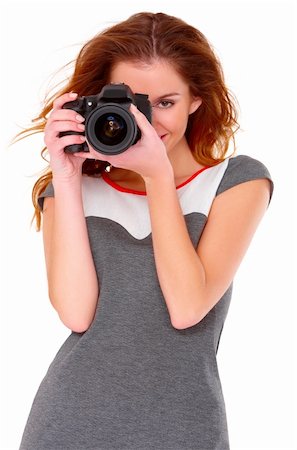 stylish woman snapshot - Cute young woman in gray dress with digtal camera on white Stock Photo - Budget Royalty-Free & Subscription, Code: 400-05734576
