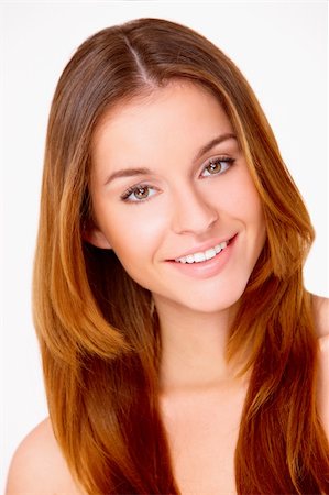 Portrait of beautiful young smiling woman isolated on white Stock Photo - Budget Royalty-Free & Subscription, Code: 400-05734583