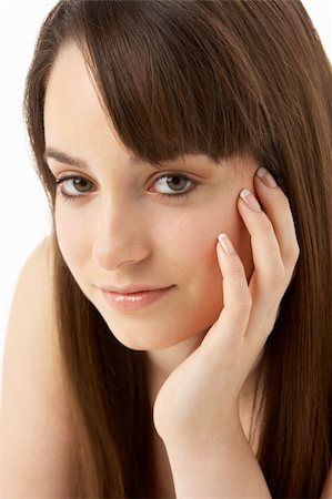 simsearch:400-06104816,k - Studio Portrait Of Teenage Girl On White Background Stock Photo - Budget Royalty-Free & Subscription, Code: 400-05734864